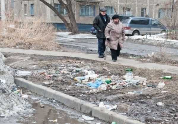 Cугробы, потопы и маски вместо подснежников: 14 фотографий городской весны 2021